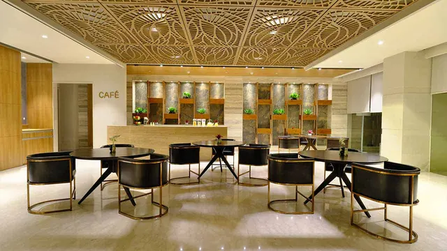 Adani Oyster Grande — clubhouse cafe interior
