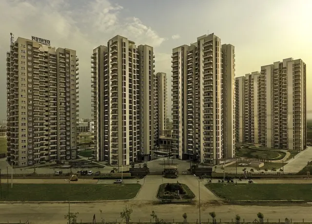Adani Oyster Grande — tower cluster elevation (real photo)