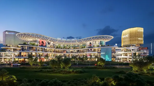 AIPL Joy District — front elevation at dusk, wide