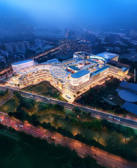 AIPL Joy District — aerial view at night (portrait)