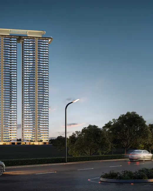 AIPL Riviera — twin 43-storey towers exterior at dusk
