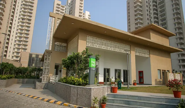 Alpha Gurgaon One — clubhouse entrance (real photo)