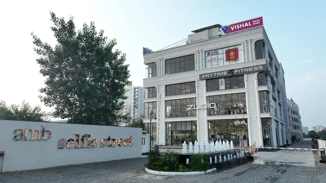 AMB Selfie Street — entrance corner with signage (real photo)