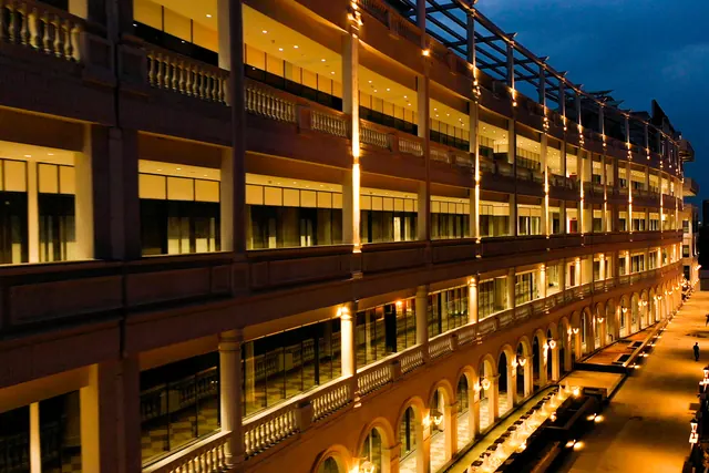 AMB Selfie Street — upper retail levels lit at night