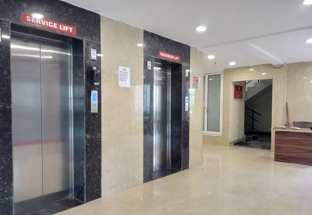 Ansal Heights 86 — lift lobby interior (real photo)