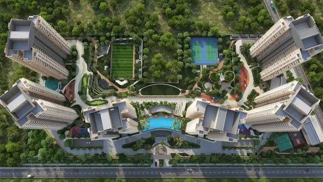 Ashiana Aaroham — top-down aerial of site with clubhouse and courts