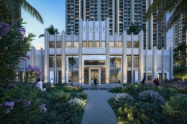 ATS HomeKraft Sanctuary 105 — clubhouse facade with landscaped walkway