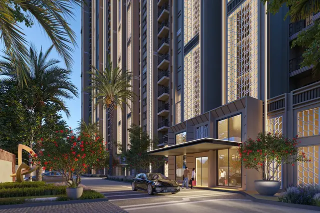 ATS HomeKraft Sanctuary 105 — tower drop-off / lobby entrance at dusk