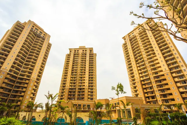 ATS Kocoon Gurgaon — towers from podium, low angle