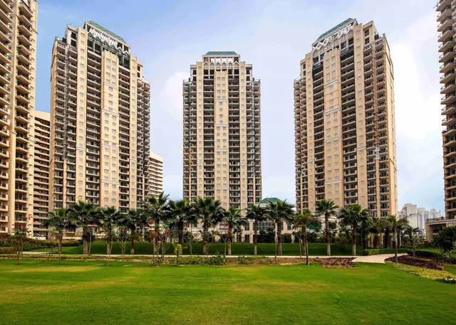 ATS Tourmaline — towers behind palm-lined lawn (real photo)