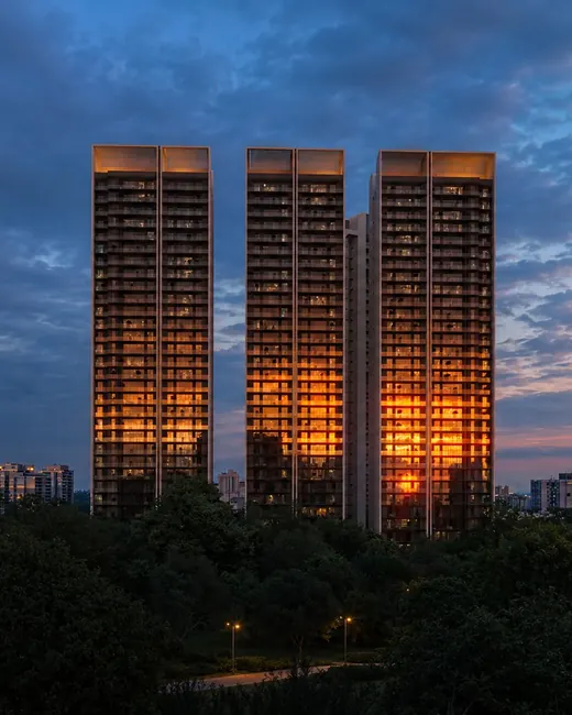 Aura The Aerth — Tower cluster at dusk (render)
