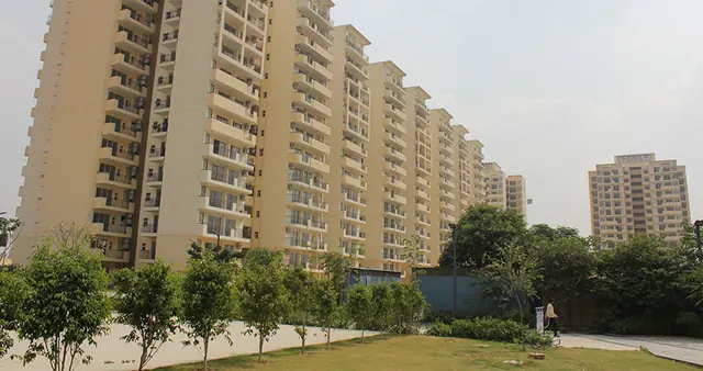 Bestech Park View Ananda — towers with lawn