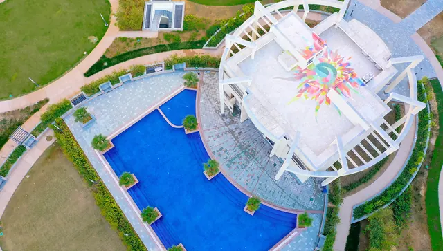 Bestech Park View Sanskriti — aerial of clubhouse and pool