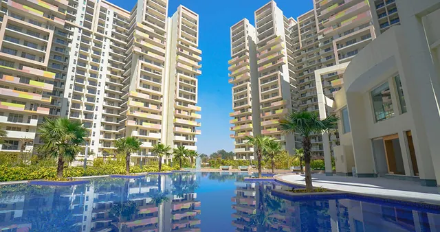 Bestech Park View Sanskriti — towers and pool