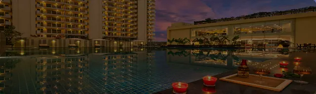 BPTP Terra — pool and clubhouse panoramic at dusk