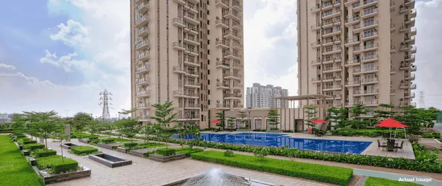 Conscient Heritage Max — landscaped podium and pool (actual photo)