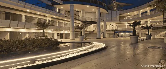 Conscient One Gurgaon — courtyard with water feature