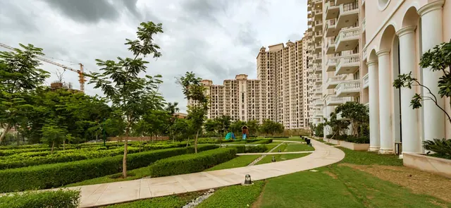 DLF Regal Gardens — landscaped gardens and towers (real photo)