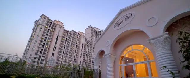 DLF Regal Gardens — Regal Club clubhouse entrance (real photo)