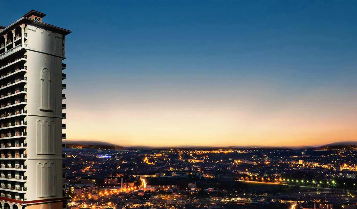 DLF Sky Court — tower at dusk over city skyline (render)