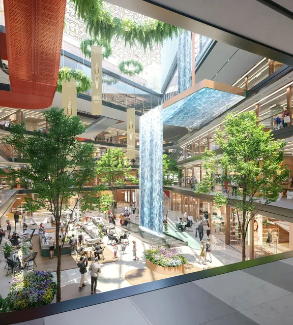 Elan Imperial — Atrium with waterfall and planters (render)