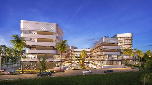 Elan Miracle — Street-side elevation with palm-lined drop-off (render)