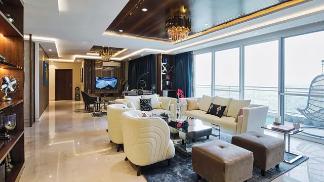 Experion Windchants — sample apartment living room (photo)