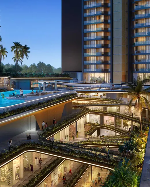 Ganga Realty Nandaka — clubhouse podium with infinity pool at dusk