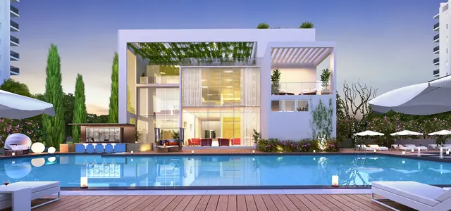 Godrej Aria — clubhouse pool deck at dusk