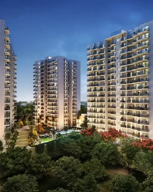 Godrej Habitat Gurgaon — towers exterior at dusk