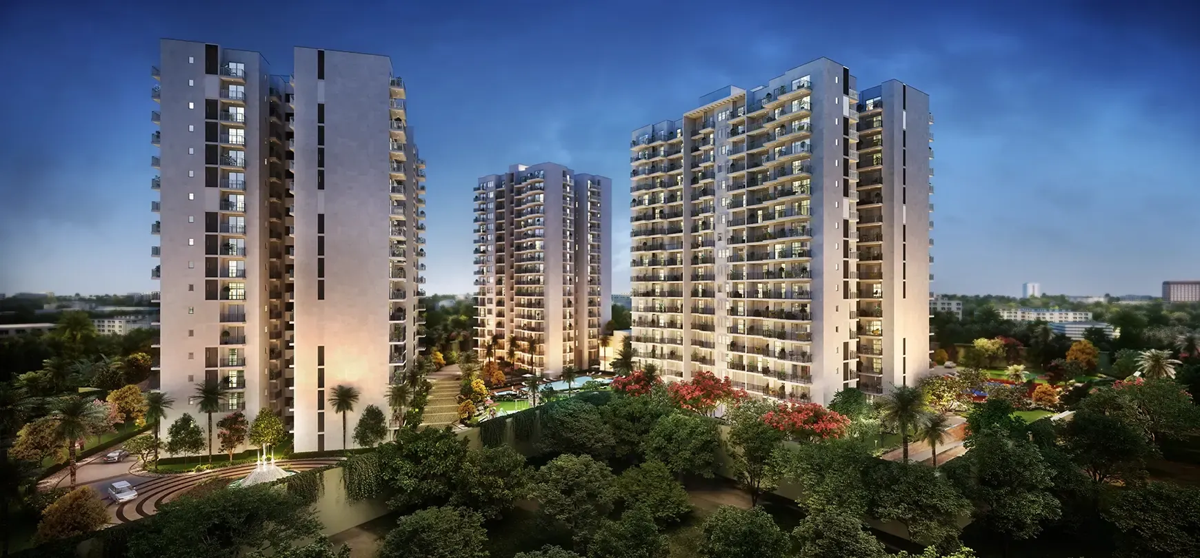 Godrej Habitat Gurgaon — towers exterior at dusk