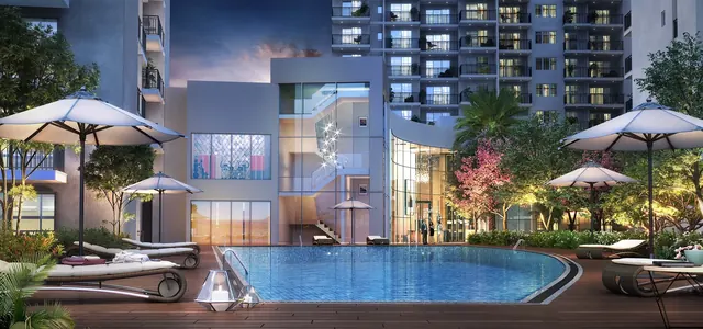 Godrej Habitat Gurgaon — clubhouse and pool at dusk