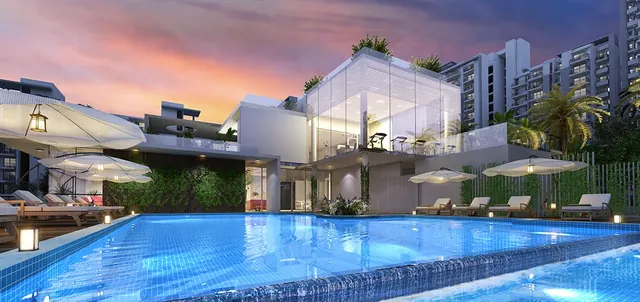 Godrej Icon — clubhouse and pool at dusk