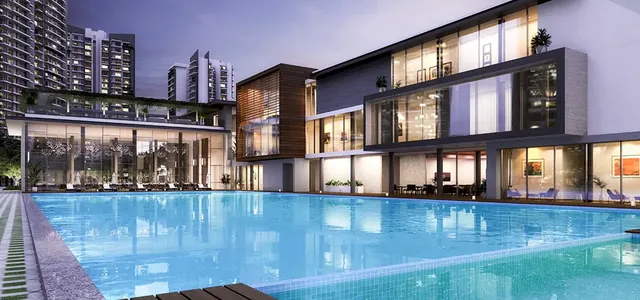 Godrej Meridien — clubhouse and pool at dusk