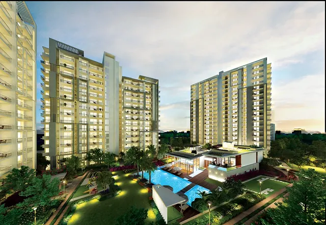Godrej Oasis — towers and clubhouse at dusk