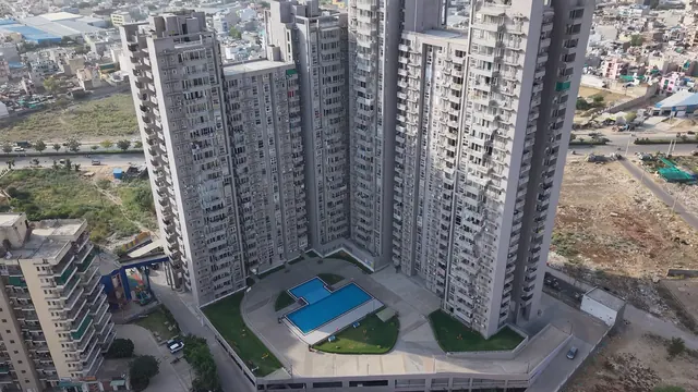 ILD Grand — drone photo of towers and pool (actual)