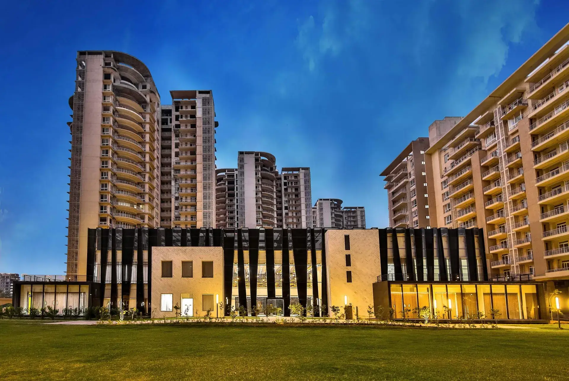 Indiabulls Enigma — towers and clubhouse at dusk (actual photo)