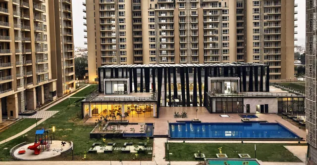 Indiabulls Enigma — clubhouse, pool and towers from above (actual photo)
