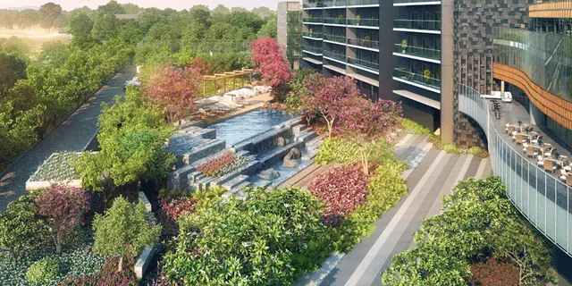 Krisumi Waterfall Residences — alfresco dining by pool with towers