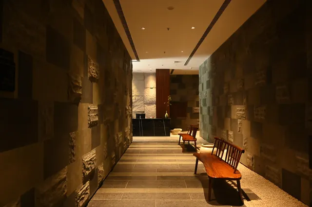 Krisumi Waterfall Residences — spa corridor (actual photo)
