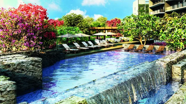 Krisumi Waterfall Suites — main garden with waterfall pool