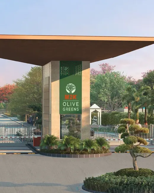 M2K Olive Green Floors — entrance gate and landscaped plaza (right edge faded into banner)