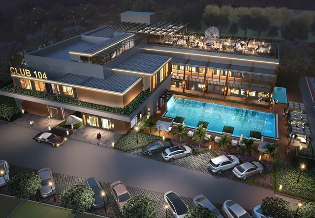 M2K Olive Green Floors — Club 104 clubhouse aerial at night