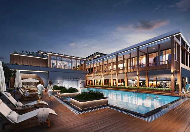 M2K Olive Green Floors — clubhouse pool deck at dusk
