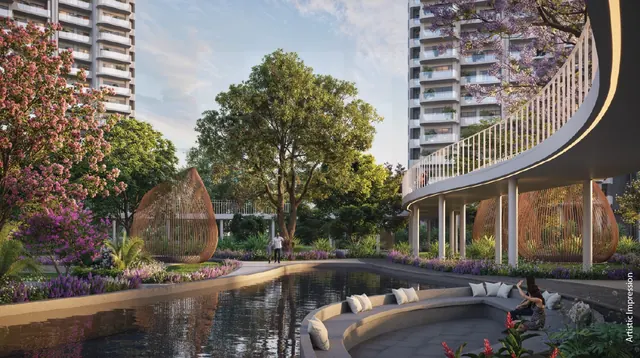 M3M Forestia West — landscaped lagoon with skywalk