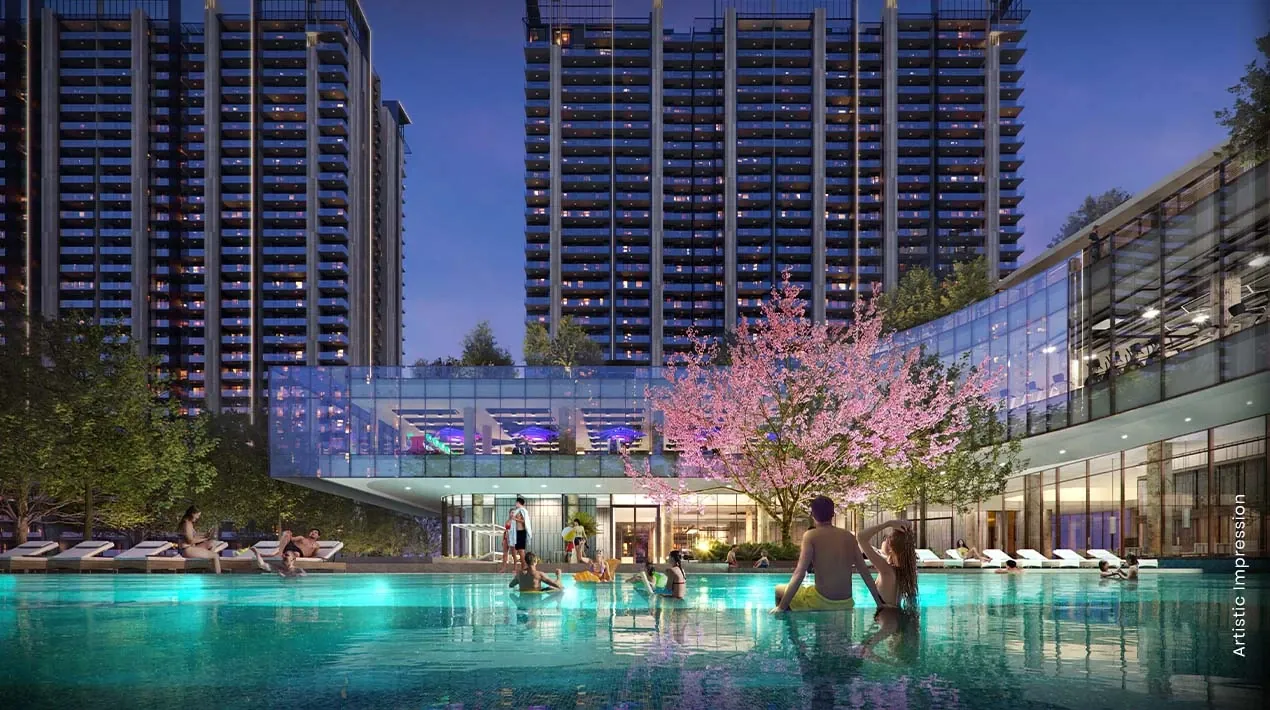 M3M Golf Hills — towers and clubhouse pool at dusk