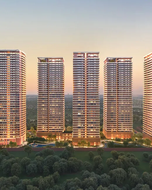 Max Estates 360 — six towers elevation at dusk (render)