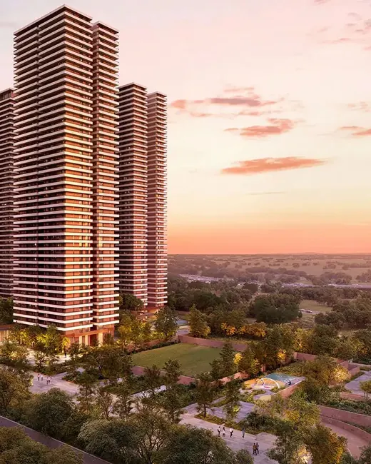 Max Estates 361 — Sunset render of the Estate 361 towers above the surrounding greens