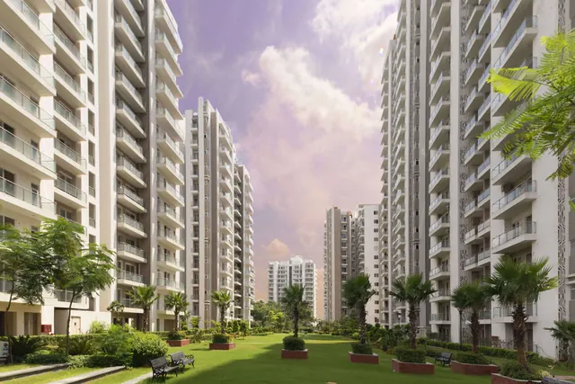 Microtek Greenburg Gurgaon — towers and landscaped boulevard (real photo)