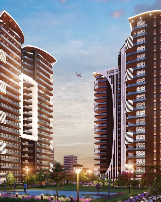 Oxirich Chintamani — twin towers at sunset (render)